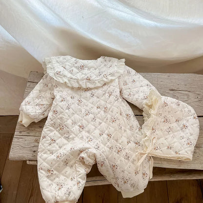 Baby unisex floral romper with warm fur lining and a comfortable winter baby hat.