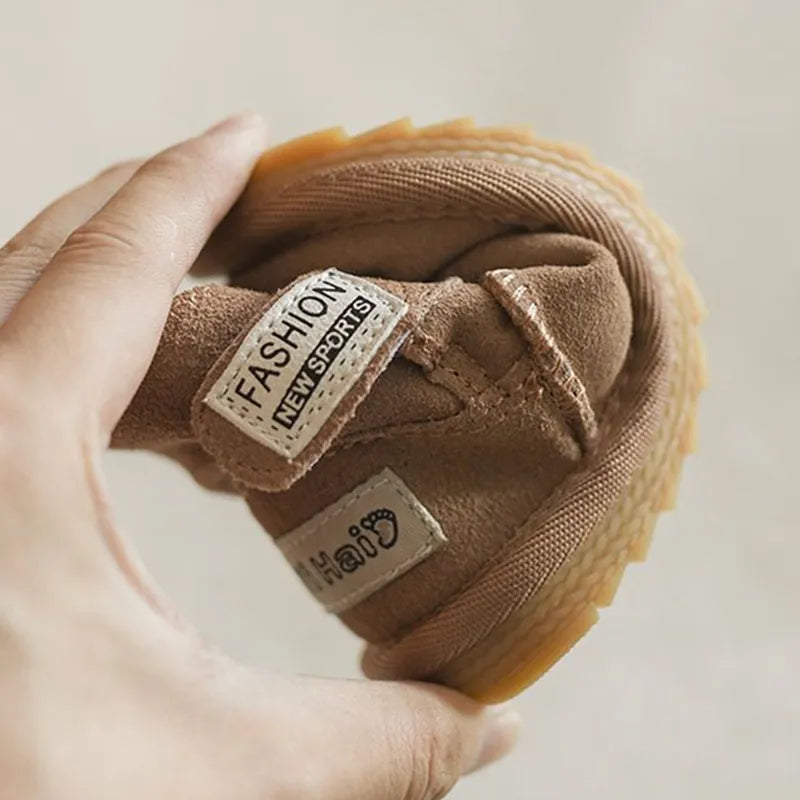 Collection of anti-slip baby snow boots in various colors: pink, khaki, brown, ready for winter