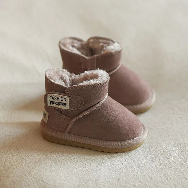 Unisex baby winter snow boots in khaki, displayed with a warm blanket, emphasizing comfort