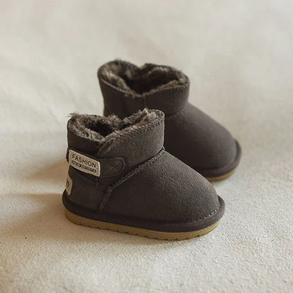 Front view of khaki baby winter boots, showcasing wide opening and zip closure for comfort