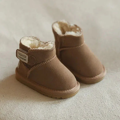 Side view of warm brown toddler snow boots, durable genuine leather, high-top design, for active babies