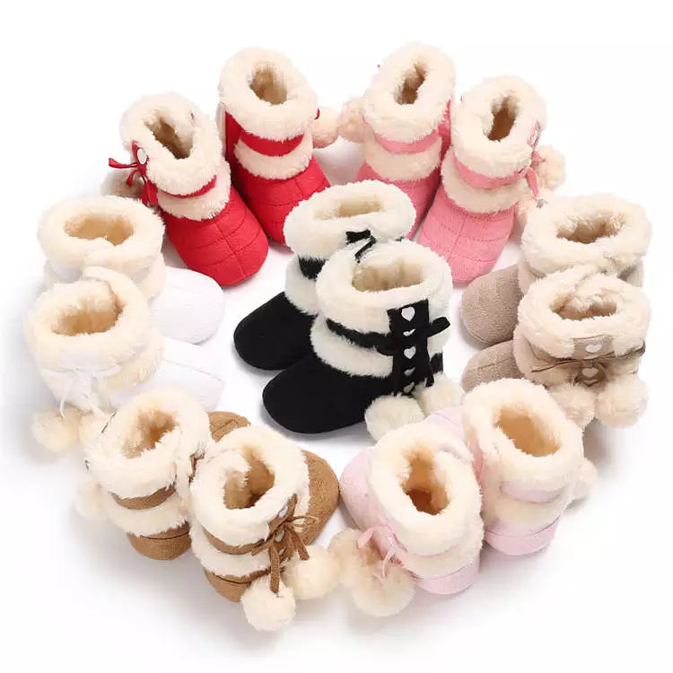 Unisex baby boots, warm and soft for winter, featuring adorable fluff balls