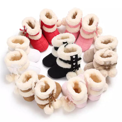 Unisex baby boots, warm and soft for winter, featuring adorable fluff balls