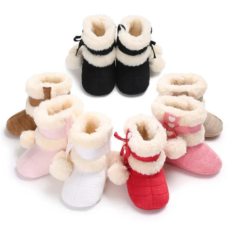 Toddler snow boots with soft fluff balls and hook-loop closure, warm baby shoes
