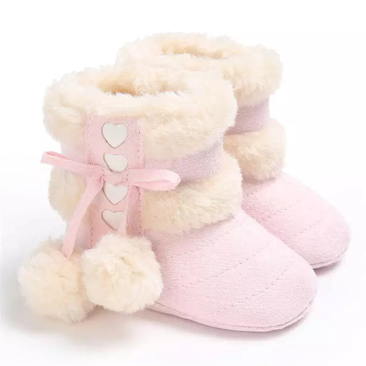 Soft sole snow boots for baby, unisex design with charming fluff balls