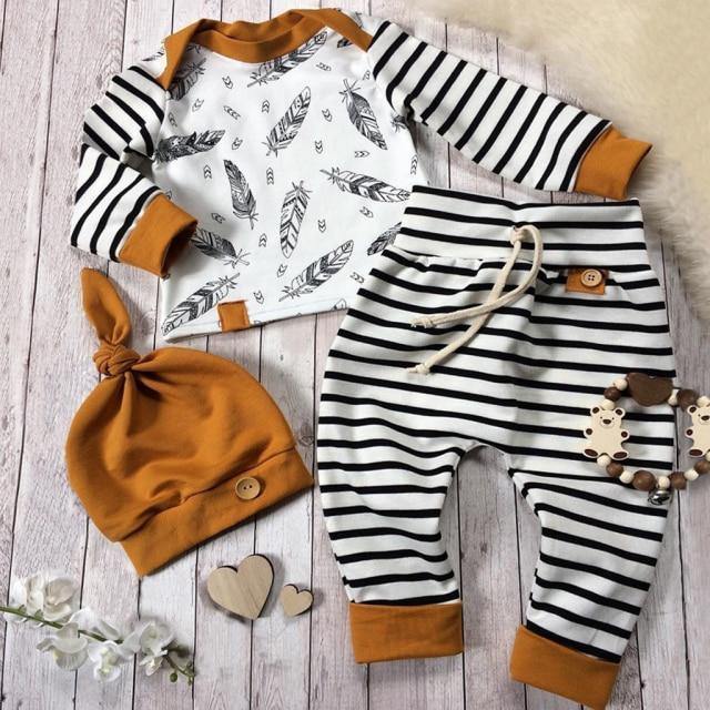 Soft cotton unisex baby bodysuit and hat set featuring a stylish zebra print design.