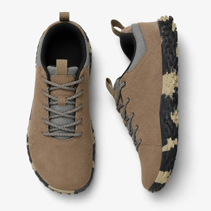 Zero drop, wide toe hiking trainers, offering flexible support for minimalist outdoor walks.