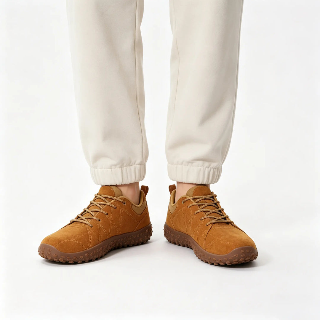 Minimalist hiking trainers with orthopedic comfort and wide toe box for trail walking.
