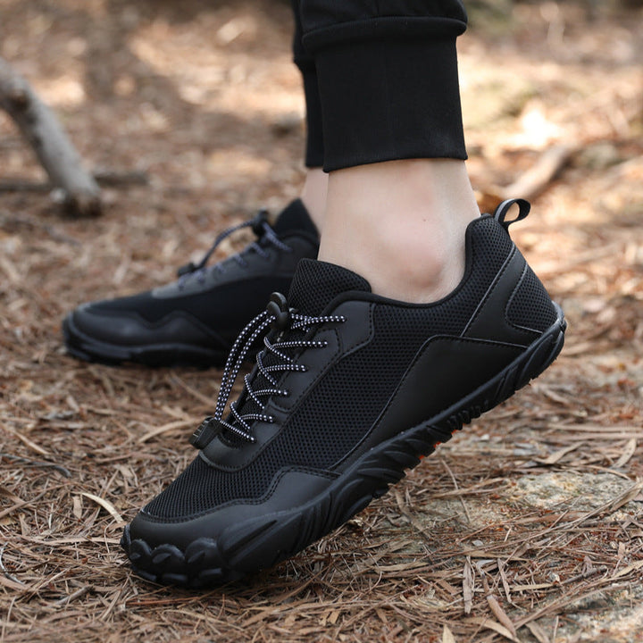 Outdoor barefoot hiking trainers, wide toe box for optimal foot splay, non-slip sole for safe trail exploration.