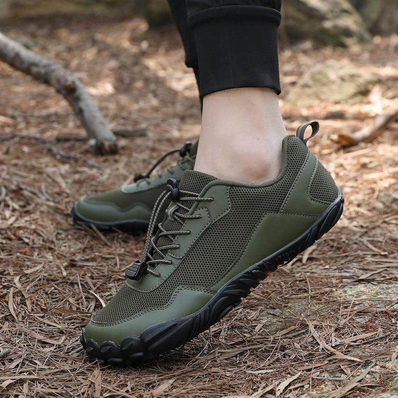 Rugged barefoot trail trainers, wide toe box, non-slip grip, ensuring natural foot comfort on challenging hikes.
