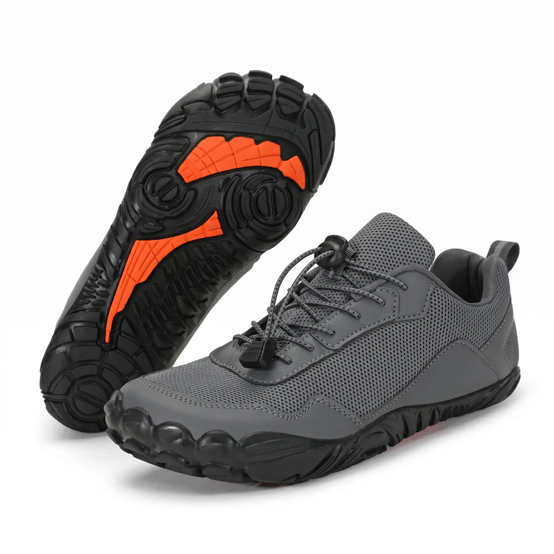 Non-slip unisex hiking trainers, wide toe box, designed for natural foot splay and comfort on varied terrain.