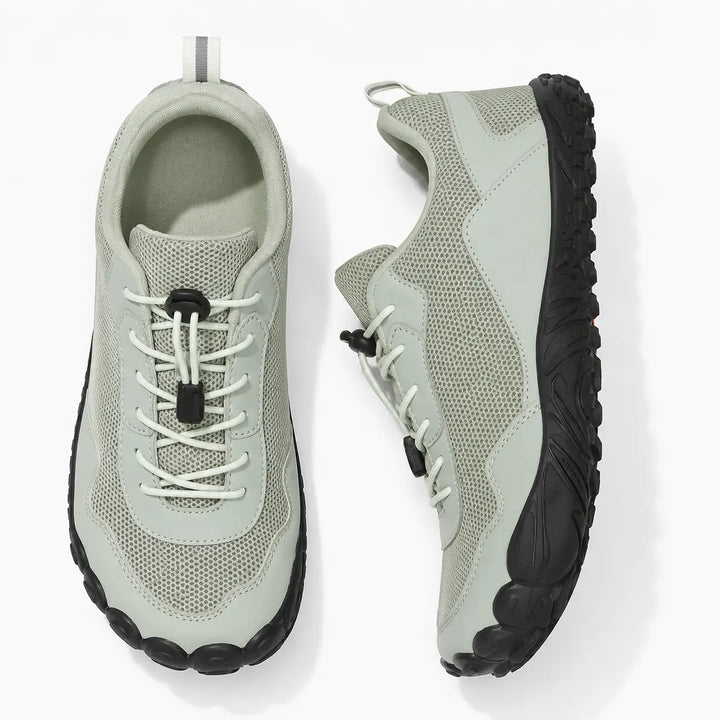Comfortable barefoot trail shoes with wide toe box, flexible design for natural walking and outdoor activities.