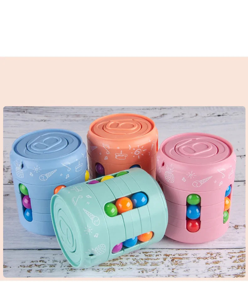 Hand holding a black spinning fidget cube, ideal for focus and anxiety relief.