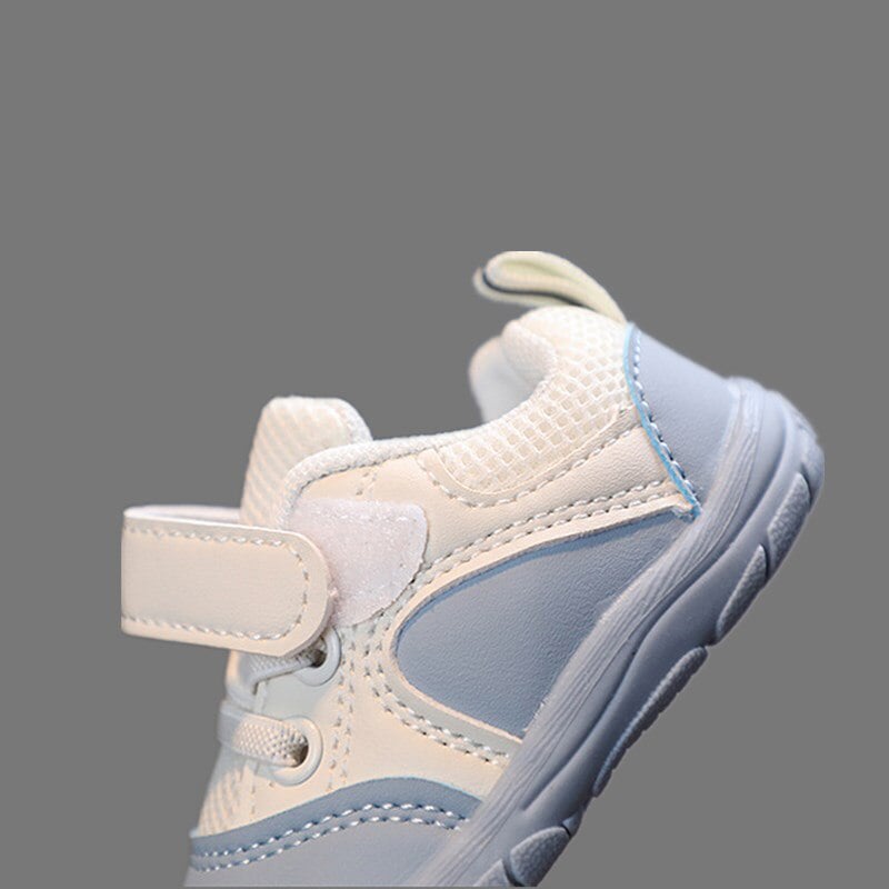 Stylish blue first walker infant shoes, promoting healthy foot development
