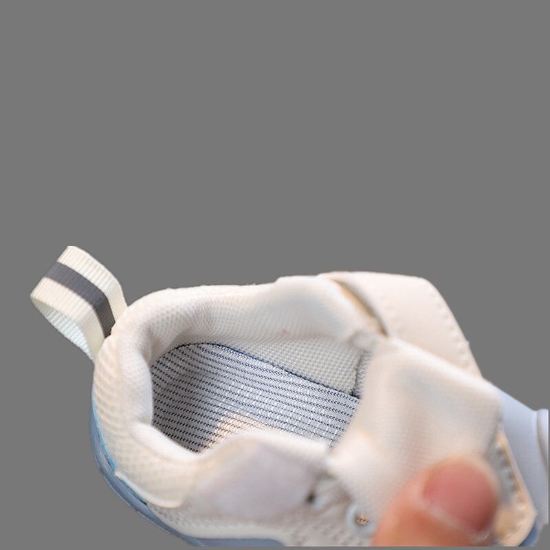 Soft blue baby shoes, first walker design for infant foot development