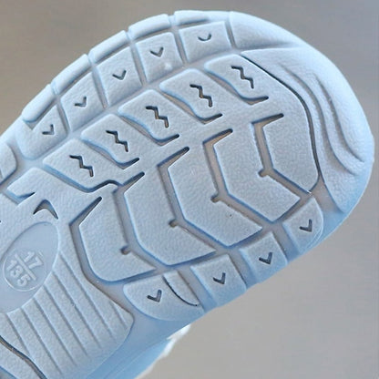 Blue unisex barefoot shoes for babies, ideal first walkers with flexible sole