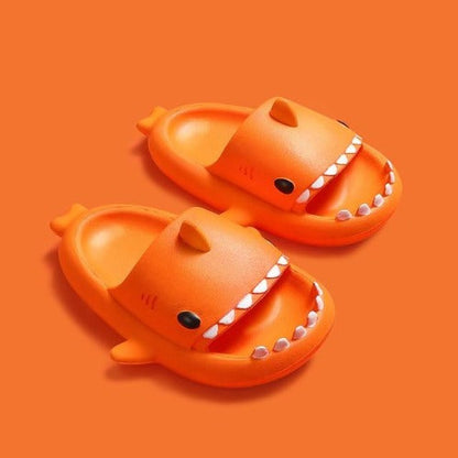 Close-up of non-slip sole on fun shark beach slippers, durable PVC material