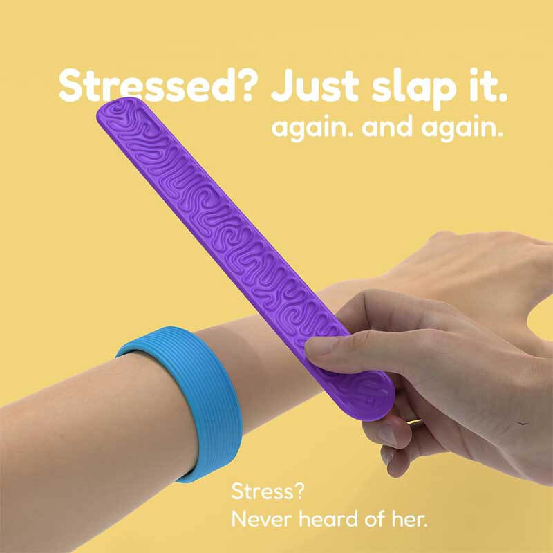 Adult demonstrating a purple unisex slap bracelet, a discreet fidget toy for anxiety and autism