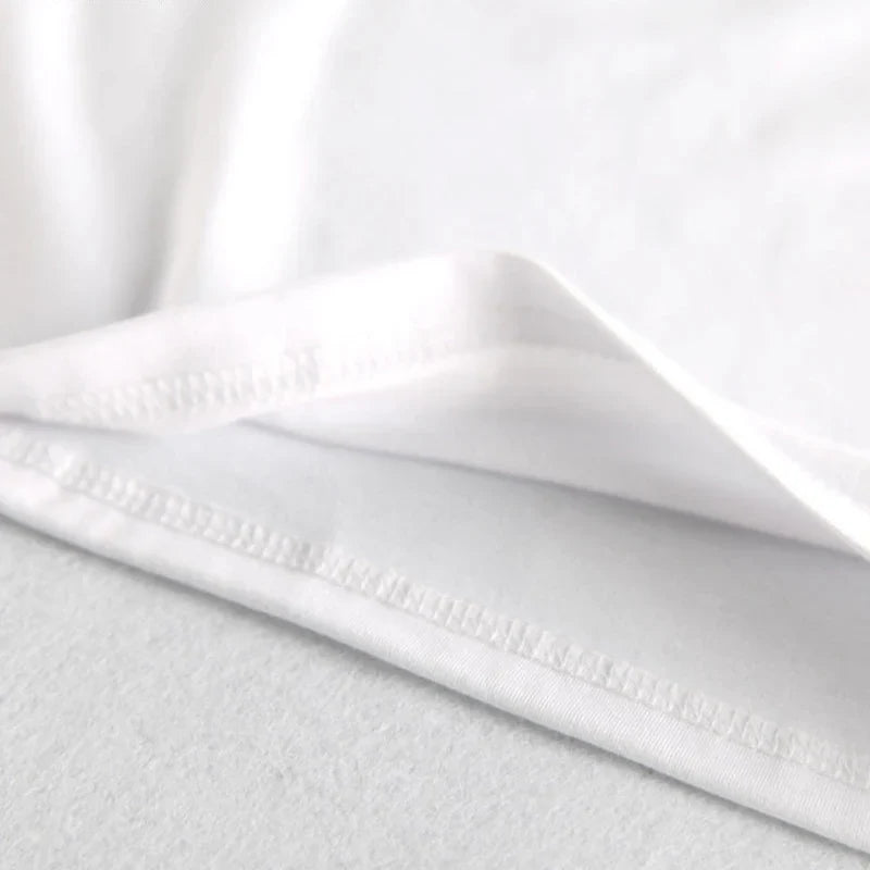 Tag from the 'Boss Man' T-shirt showing product details, high quality cotton, unisex apparel
