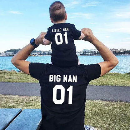 Unisex black 'Boss Man' T-shirt on a hanger, ready for casual wear, family matching outfit