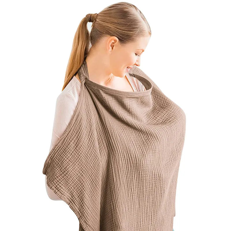 Adjustable nursing apron, unisex design, made from soft, breathable cotton gauze for discretion