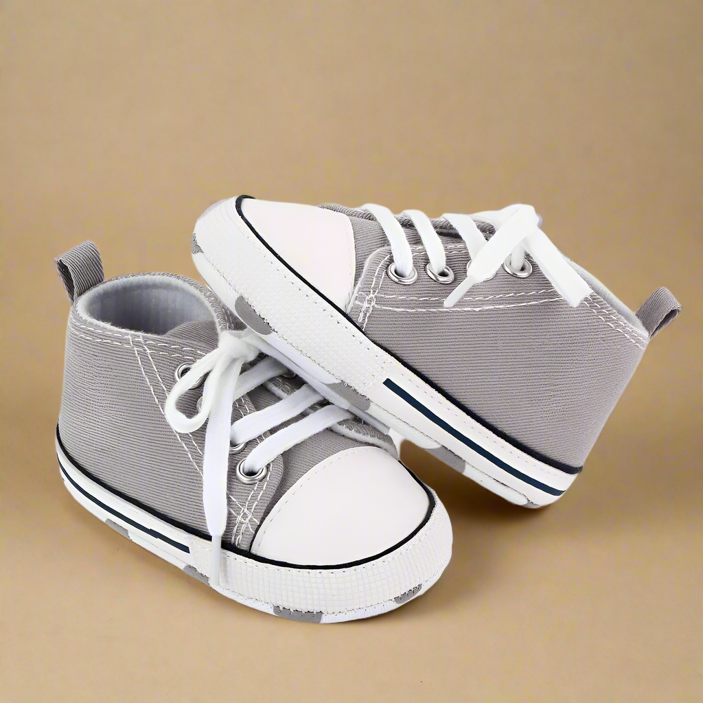 First walker baby shoes in soft pastel blue, flexible and supportive