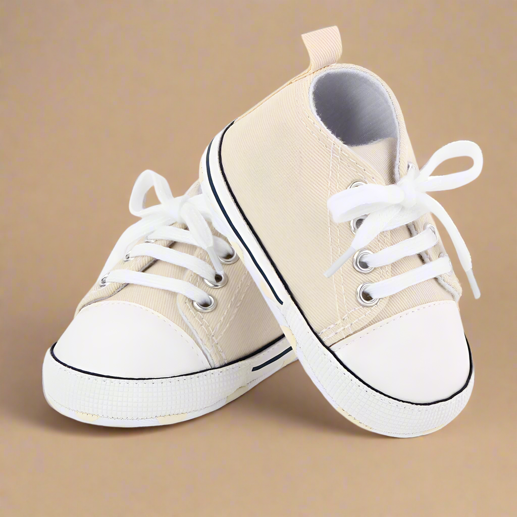 Unisex infant first walker sneakers with durable yet flexible outsoles