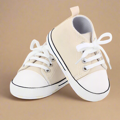 Unisex infant first walker sneakers with durable yet flexible outsoles