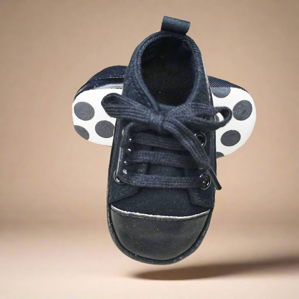 Close-up of flexible sole on breathable toddler sneakers, anti-slip texture