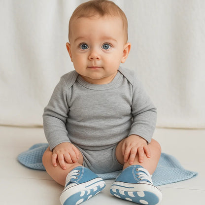 Breathable toddler sneakers in gender-neutral grey, perfect for new walkers