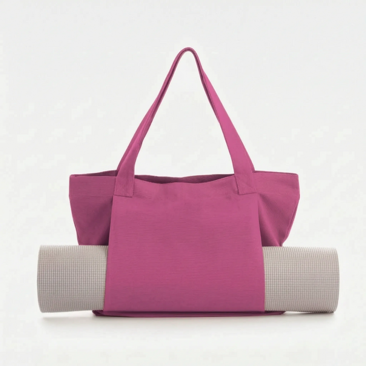 Unisex fitness tote bag designed to comfortably carry yoga mats & essentials, ideal for active lifestyles.