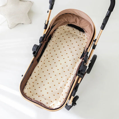 Folded cartoon baby stroller cushion showing 3-layer cotton, compact for travel
