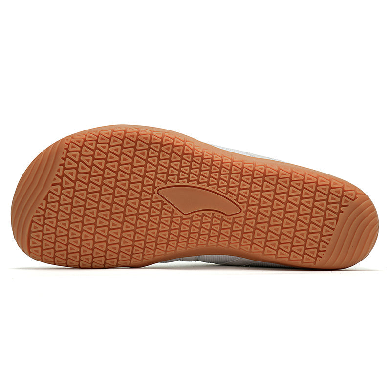 Wide toe box barefoot shoes, promoting natural foot splay, movement & all-day comfort.