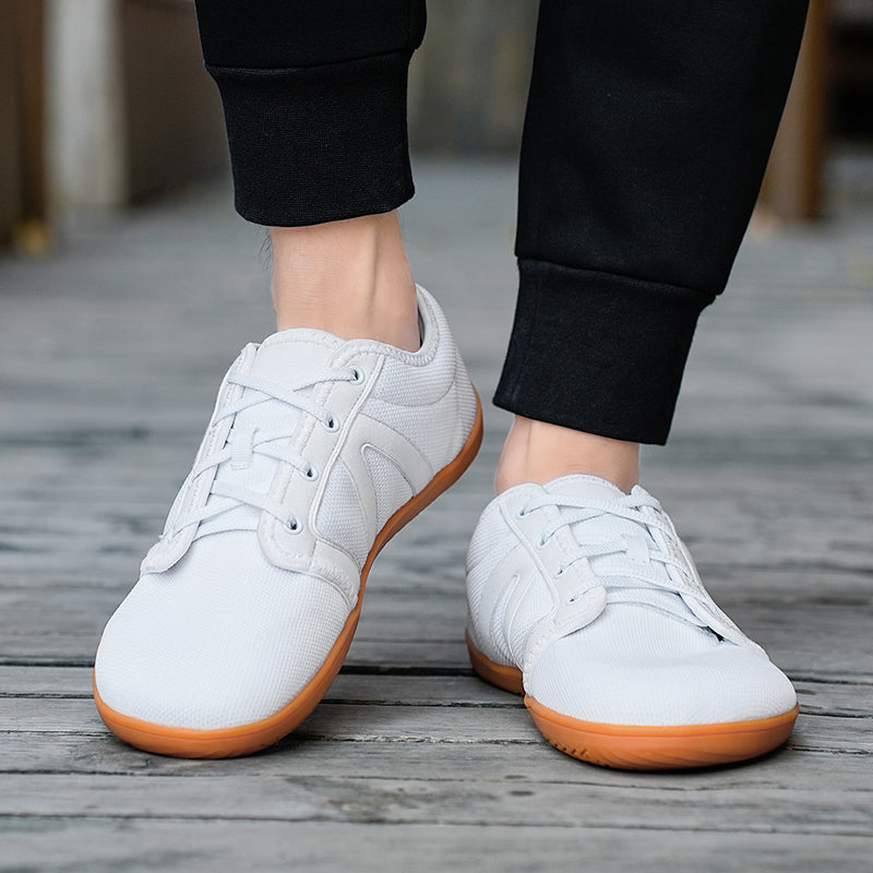 Walking shoes, barefoot style, offering natural movement, comfort & foot health for unisex users.