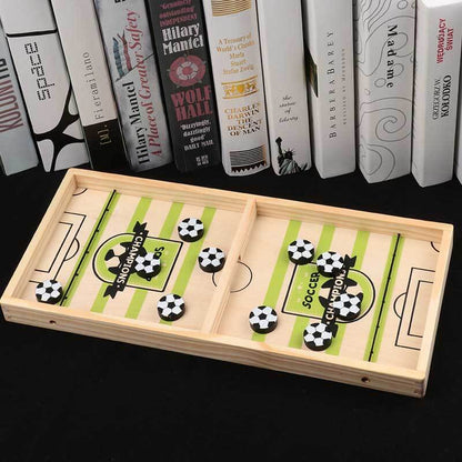 Close-up of Catapult Football board game, showing wooden pieces and playing field
