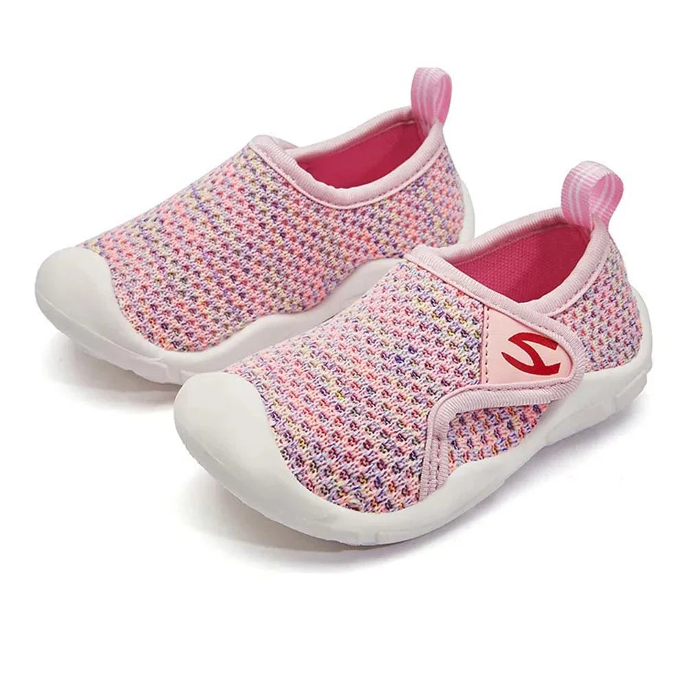 A child running in soft, flexible toddler footwear, emphasizing movement and comfort.