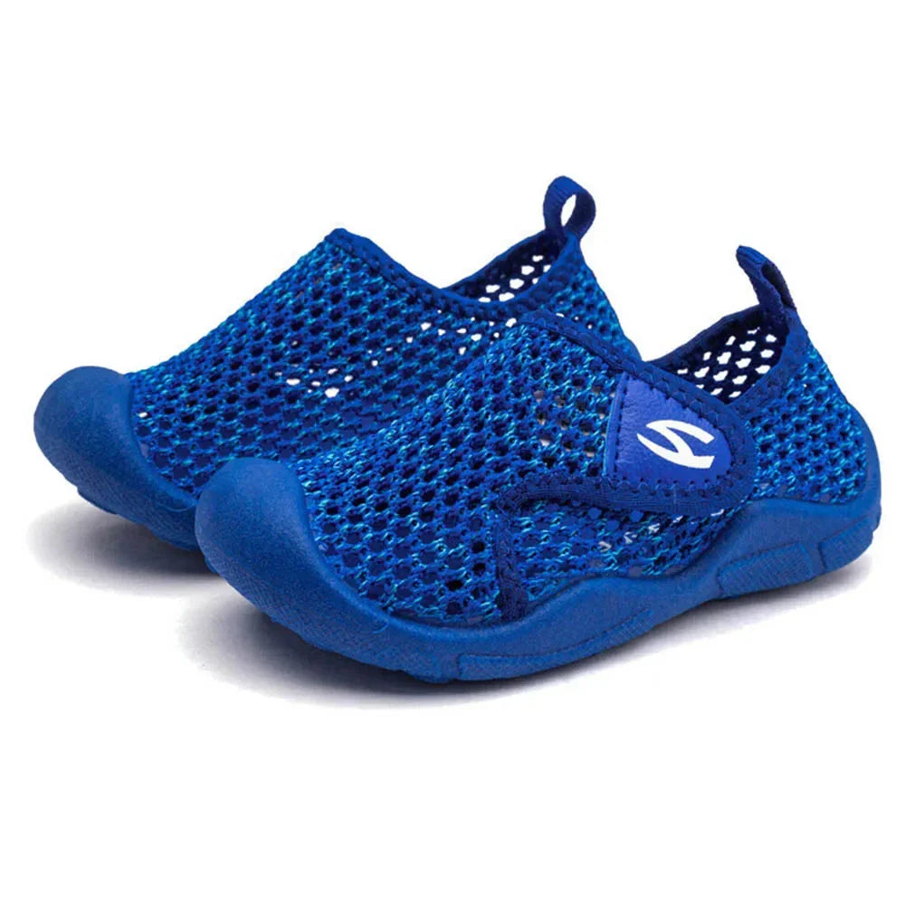 Detail shot of the non-slip tread on unisex kids shoes, designed for safety and flexibility.