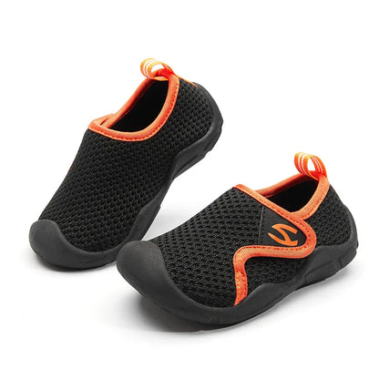 Pair of yellow flexible sole children's shoes, perfect for school or summer activities.