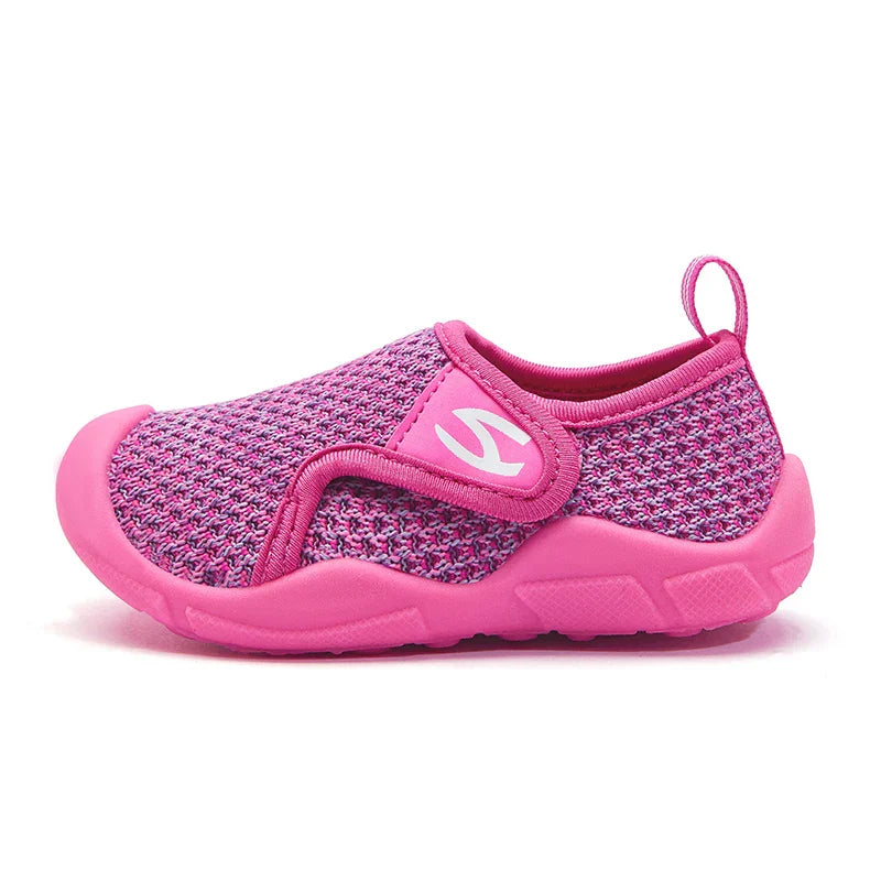 Group of colorful unisex kids sneakers, showing the range of breathable and flexible options.