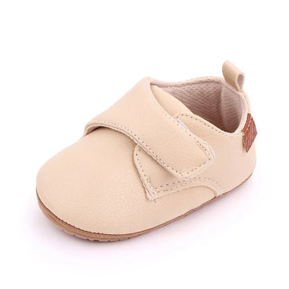 Unisex classic black leather baby anti-slip first walker shoes, essential infant footwear