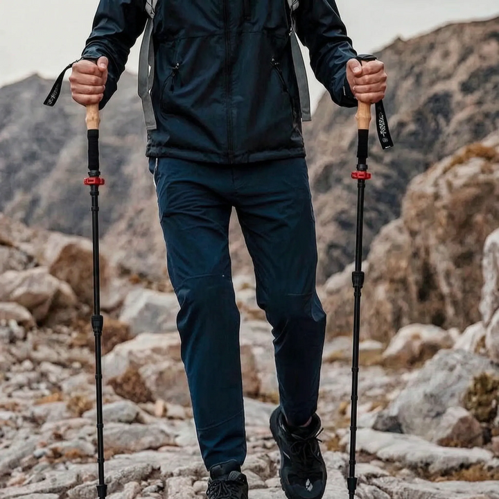Adventure-ready collapsible hiking pole set for men & women, essential lightweight gear for all outdoor trails.