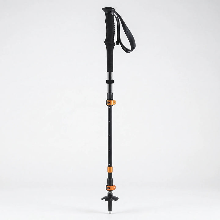 Compact folding trekking pole shown collapsed, ideal lightweight outdoor gear for easy packing on hikes.