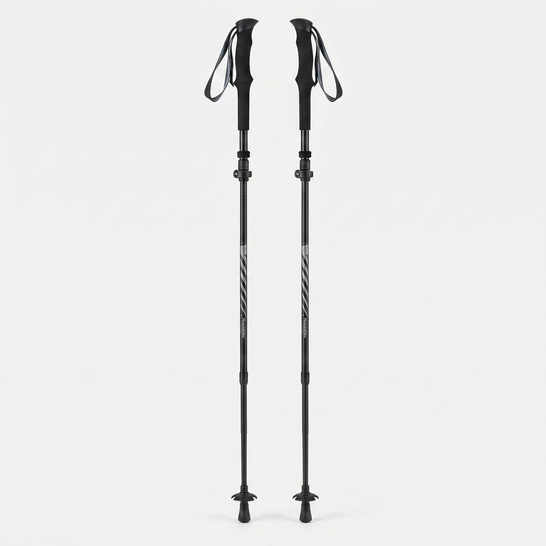 Pair of unisex compact folding trekking poles, adjustable & lightweight for stable hiking & camping adventures.