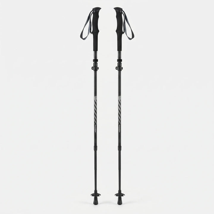 Pair of unisex compact folding trekking poles, adjustable & lightweight for stable hiking & camping adventures.
