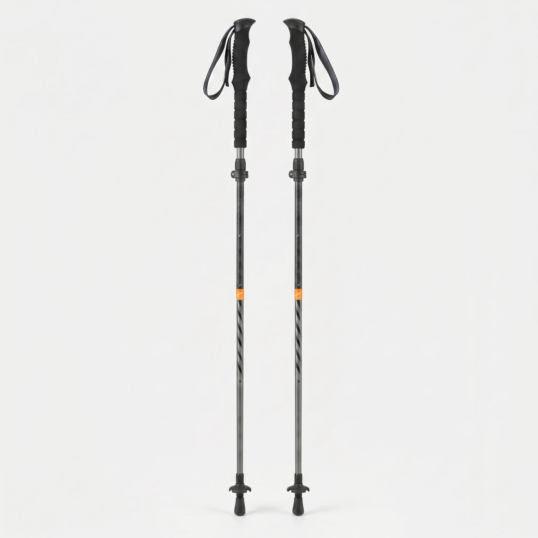 Folding trekking pole attached to a backpack, ready for lightweight hiking & trail adventures as compact gear.