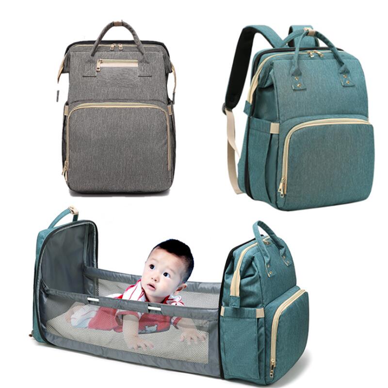 Portable baby changing station & diaper bag. Converts to a travel crib, perfect for busy moms & dads.
