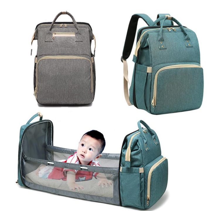 Portable baby changing station & diaper bag. Converts to a travel crib, perfect for busy moms & dads.