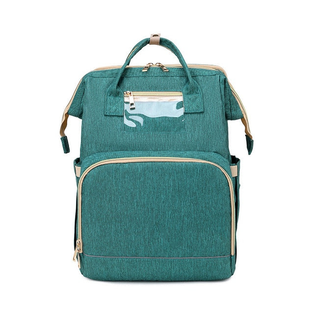 Compact travel diaper bag & portable changing station. All-in-one solution for parents on-the-go.