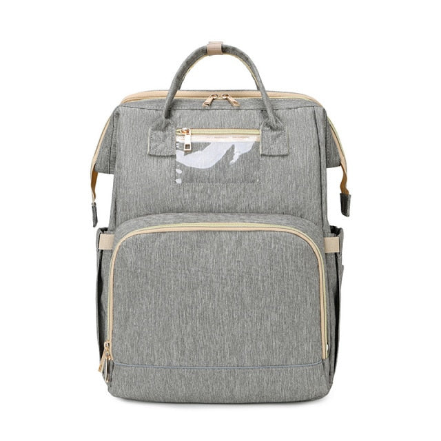 Unisex Convertible Diaper Bag & Portable Changing Station, travel crib for babies. Essential mom/dad bag.