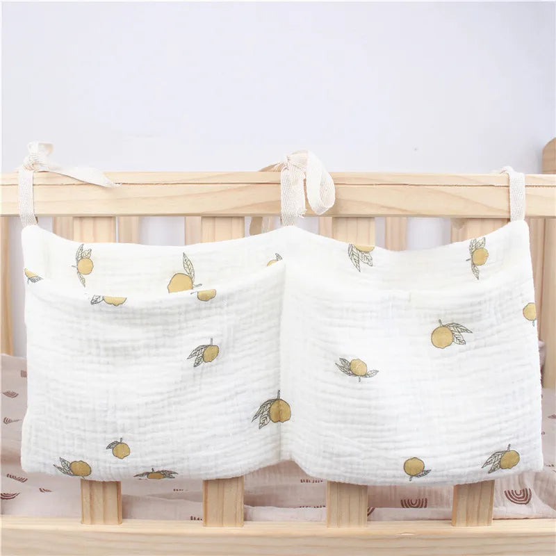 Compact hanging caddy for newborn essentials, durable cotton material